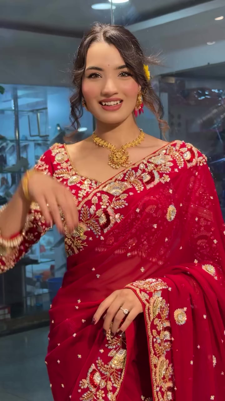 Radiant Beauty: Red Bridal Saree with Golden Embroidery