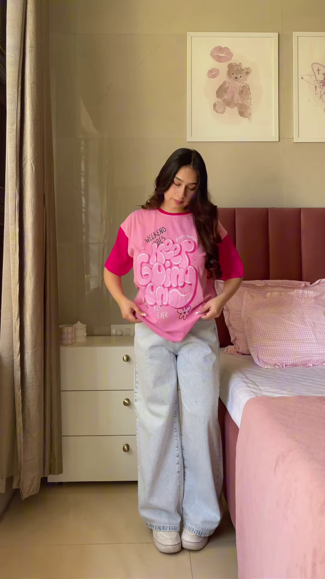 Pink Graphic T-Shirt with “Weekend Vibes” Print Paired with Light Blue Wide-Leg Jeans