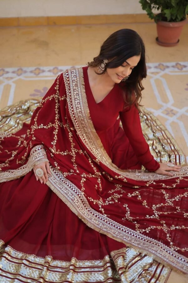 Luxurious Maroon Heavy Designer Gown with Dupatta